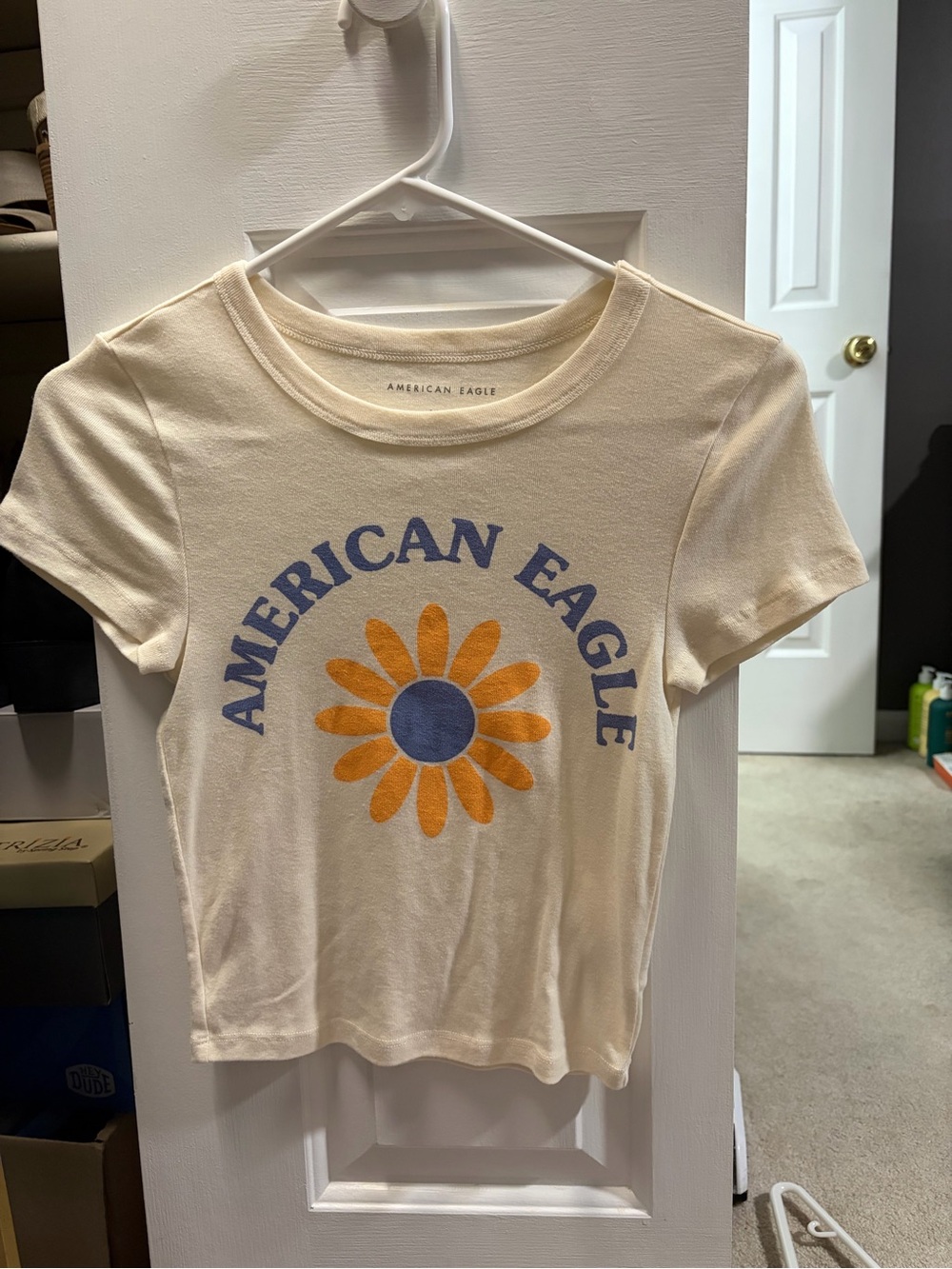 American Eagle Outfitters Cream Baby Tee with Blue and Yellow Flower - NWOT